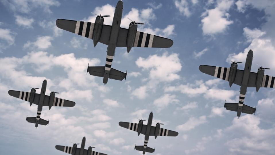 Fighter planes from WWII in the sky as part of Battle Of Normandy, D-Day, Operation Overlord, Blitz, Battle of Britain, Dunkirk and Pearl Harbor resources for secondary history students