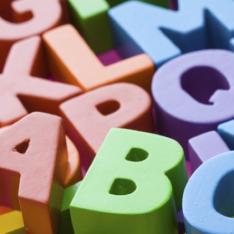Letters of the alphabet in different colours used to prepare for the Phonics screening check with primary pupils