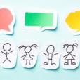 Stick people with speech bubbles above their heads signifying speaking and listening 