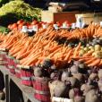 A fruit and vegetable stall to represent harvest festival activities for EYFS and primary pupils