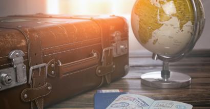 A Suitcase & Passport