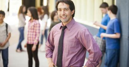 A Headteacher Standing In The Playground