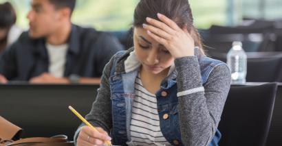 Stressed teenager, taking test