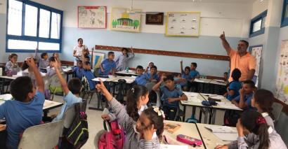 Saving the environment: Pupils around the world, including these in Palestine, have joined forces to help protect the world's rivers and oceans