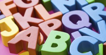 Letters of the alphabet in different colours used to prepare for the Phonics screening check with primary pupils