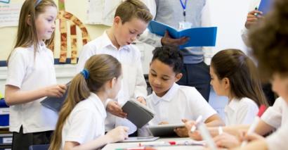 Primary Pupils Tackling Decimals In Their KS2 Primary Maths Lesson