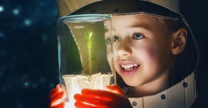 EYFS pupil using primary STEM science resources for exploration and experiment