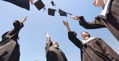 Teachers celebrating their Master's degree qualifications