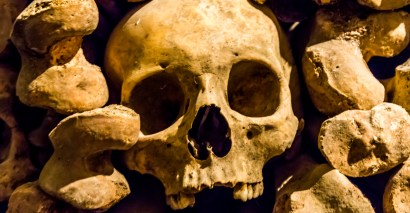 Skulls and bones representing the Black death, Great Plague and the Great fire of London for teaching secondary history students