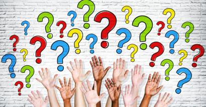 Hands up and questioning demonstrating Assessment For Learning AfL resources in the primary and secondary classroom