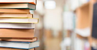 English Secondary Class Project Books Piled On A Table to use for writing and text-based English projects