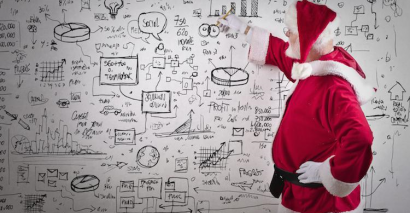 Father Christmas Completing Secondary Maths Activities On A Classroom Whiteboard