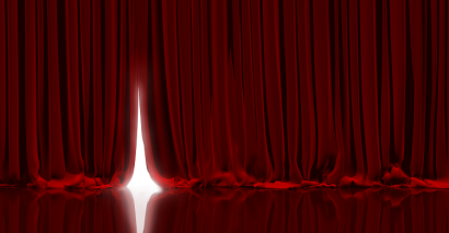 Large red curtains to signify celebration of the end of year 6