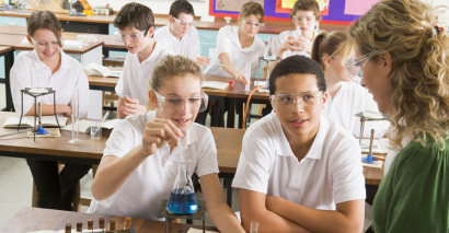 Teacher Using Revision Activities To Prepare Students For Their GCSE Exams