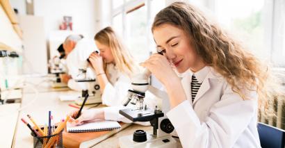 Student carring out a practical investigation in science using KS3 or KS4 Tes resource