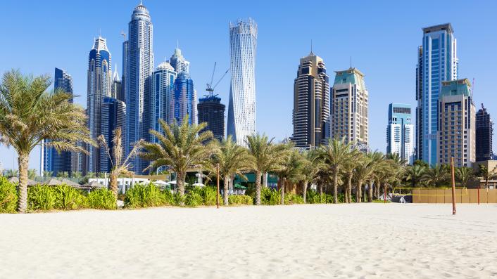 Picture of UAE beach with modern skyscrapers in background