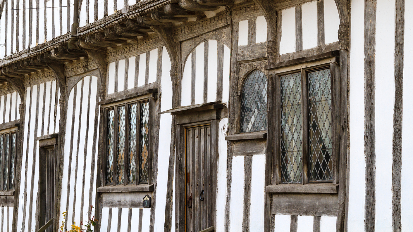 A Tudor house with wooden beams and white walls; studying Tudor housing and history in primary school