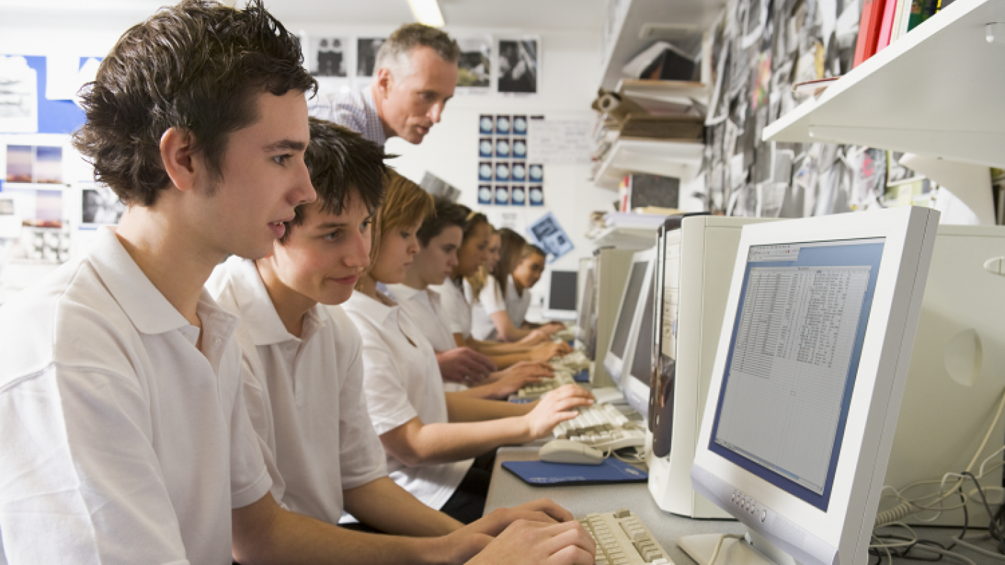 Students Having Their IT Knowledge Assessed In The Classroom