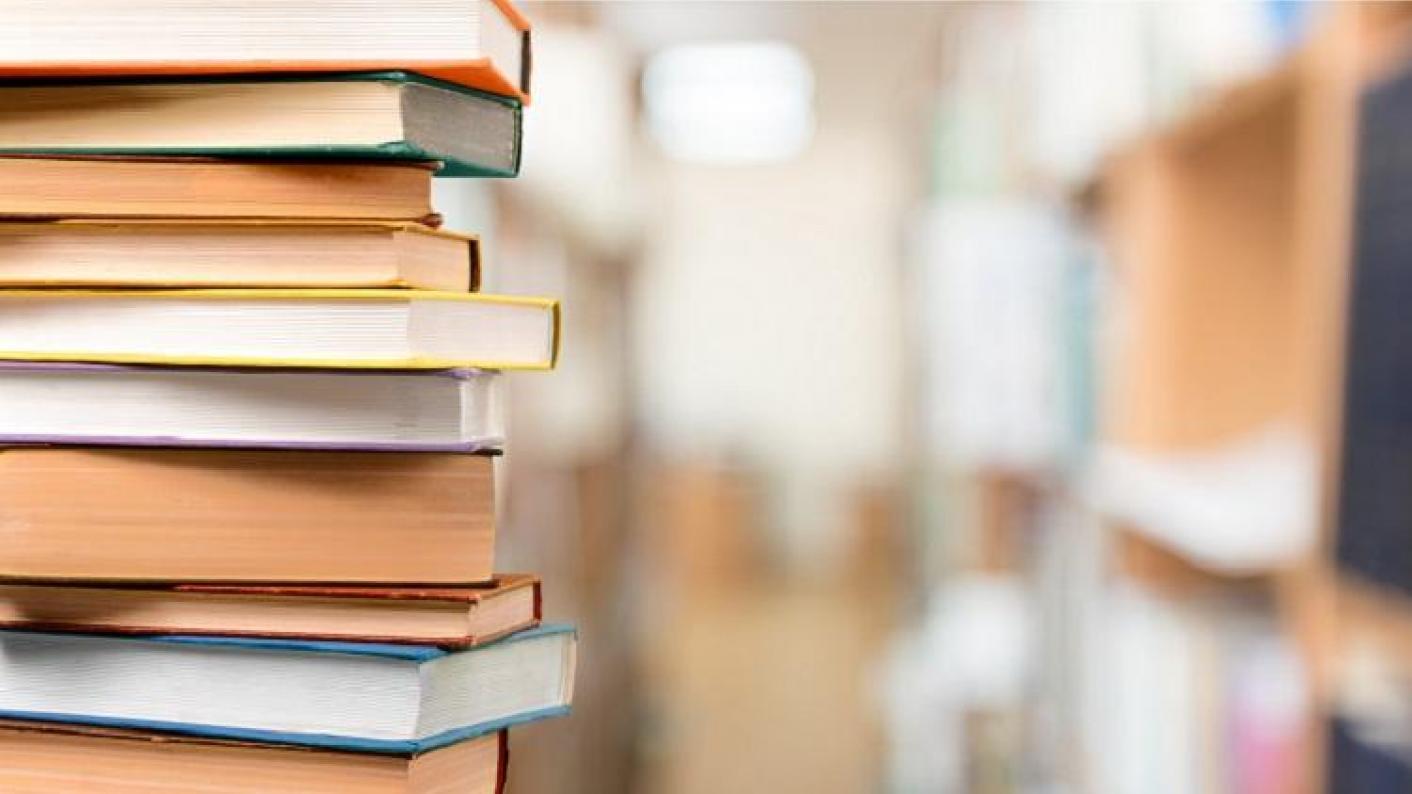 English Secondary Class Project Books Piled On A Table