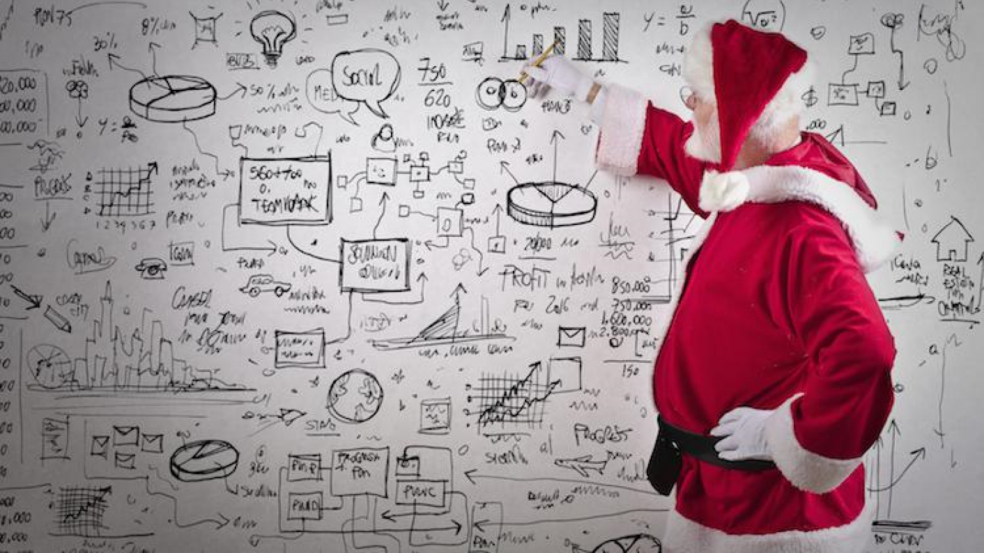 Father Christmas Completing Secondary Maths Activities On A Classroom Whiteboard