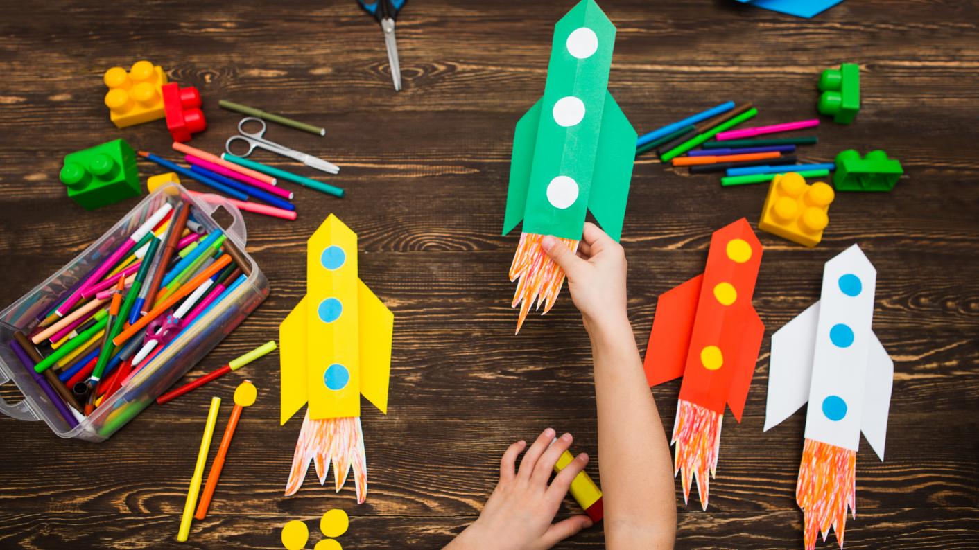 Space rockets and pencils on a desk, space resources for primary