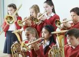 School brass band, playing instruments