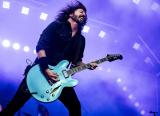 Dave Grohl, playing the guitar