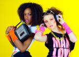 Two 1980s women listen to music