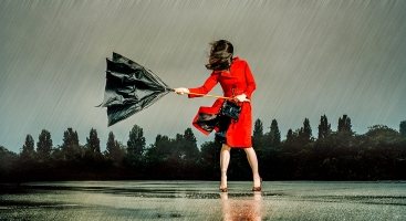 Lady with broken umbrella