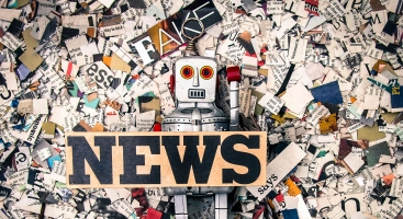 Fake news with ripped newspaper and robot