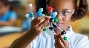 Girl in physics class