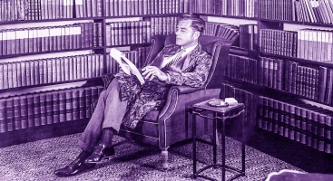 Gentleman quietly reading in an armchair