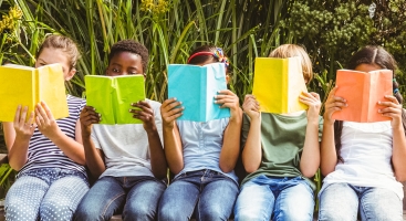 Children on bench reading