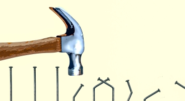 Hammer hitting nails