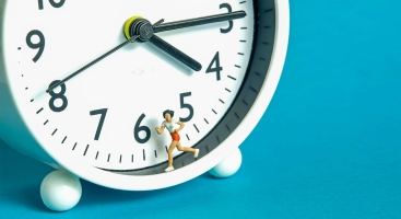 figure running around a clock