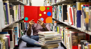 Reading books in library