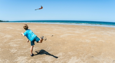 Boy throwing boomerang