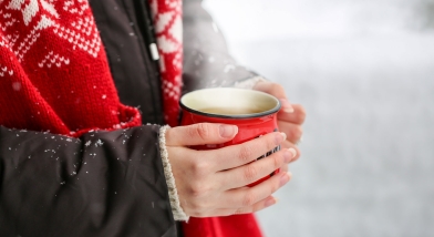 Child with cup of tea