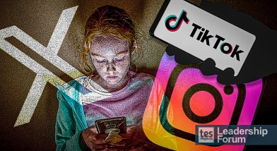 Girl on mobile phone with social media logos