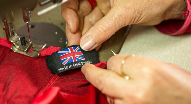 Sewing a Made in Great Britain clothing tag