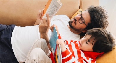 Parent and child reading together