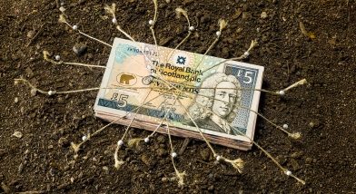 Scottish money tied to ground