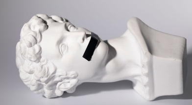 Bust with tape over mouth Silence
