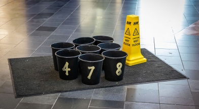 School buildings buckets catching water
