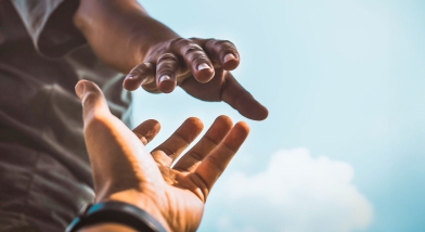 Hand reaching out to help