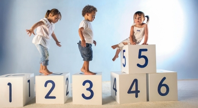 Children climbing on blocks