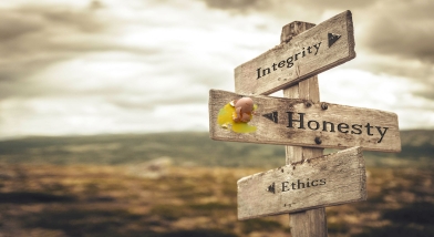 Sign post with egg splat