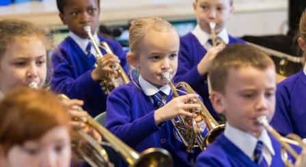 Children playing the trumpet