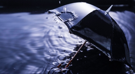 Water dripping on an umbrella