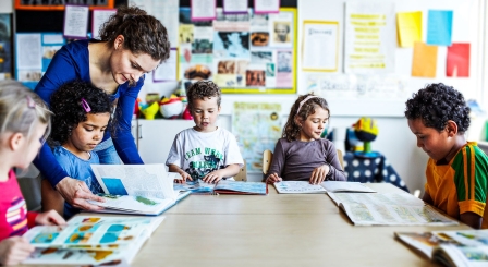 A teacher and young children in the classroom